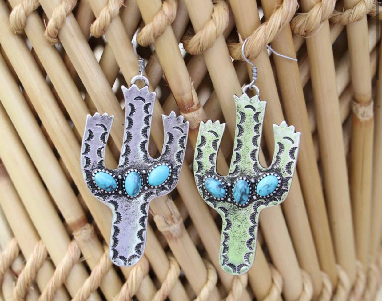 Silver cactus with turquoise stone