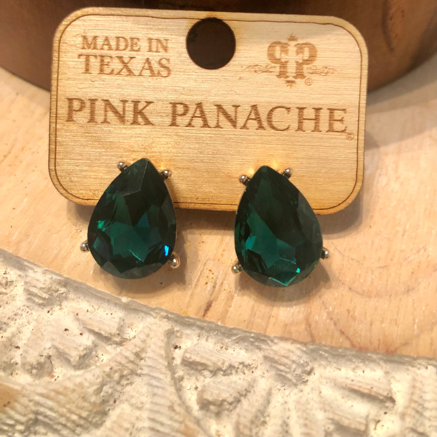 Emerald teardrop studs
