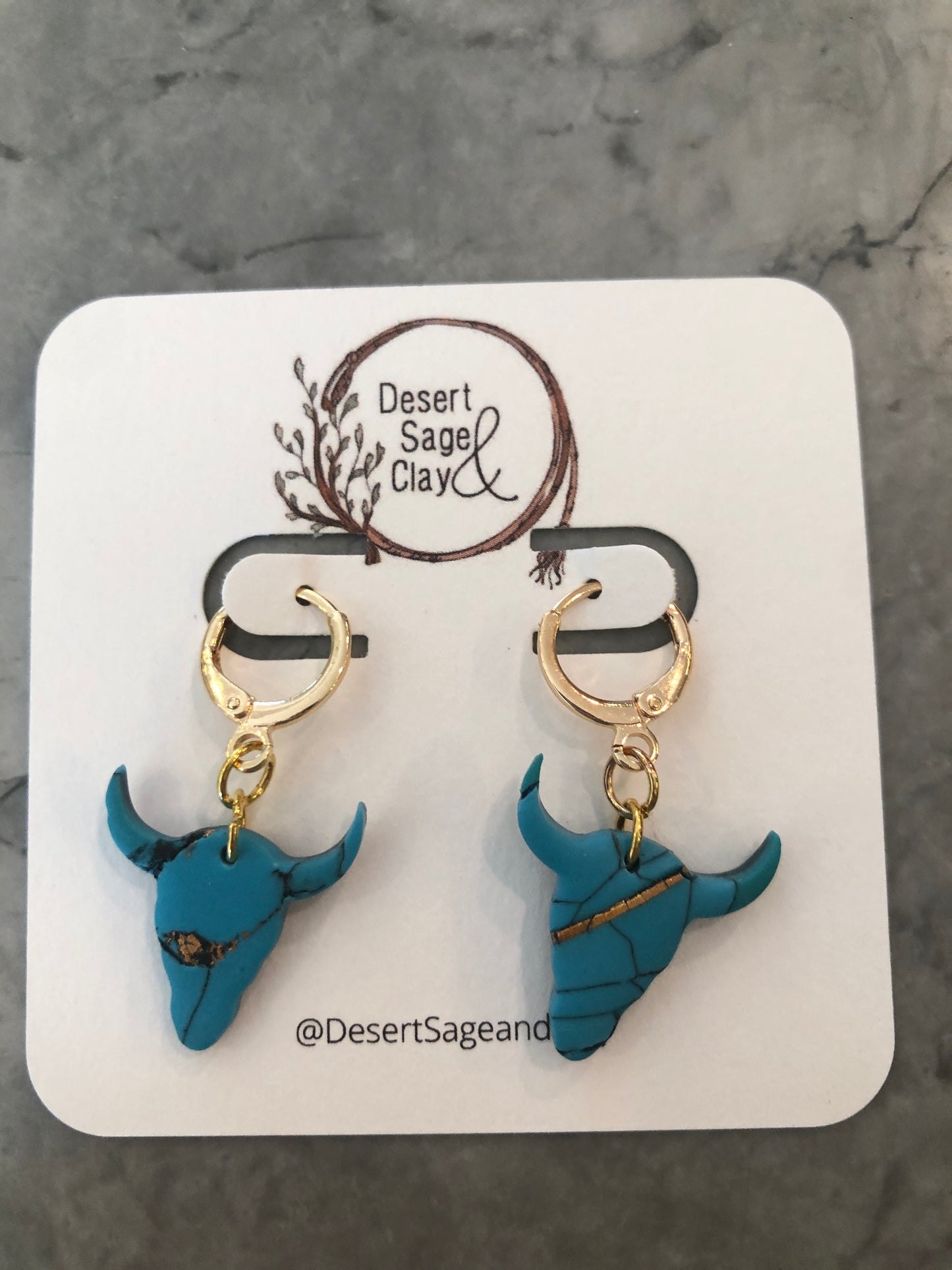 Turquoise and gold steer head