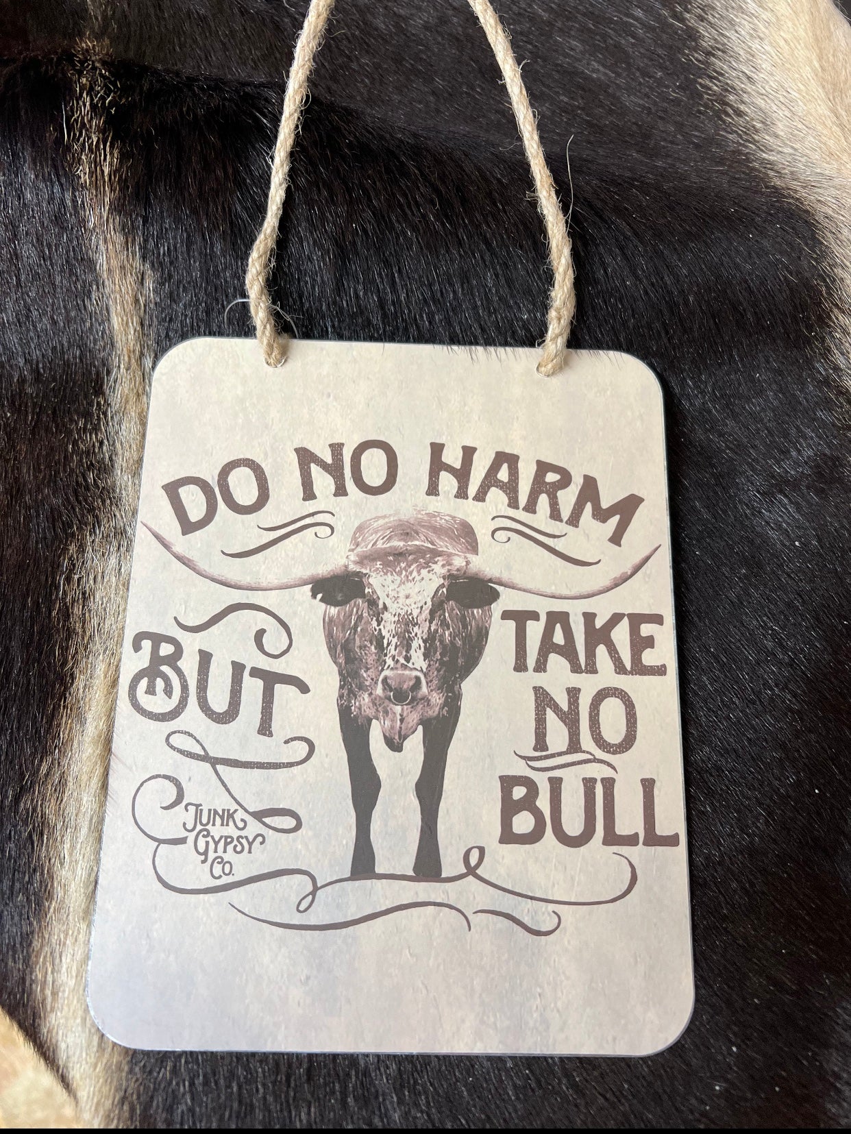 Do No Harm metal wall hanging