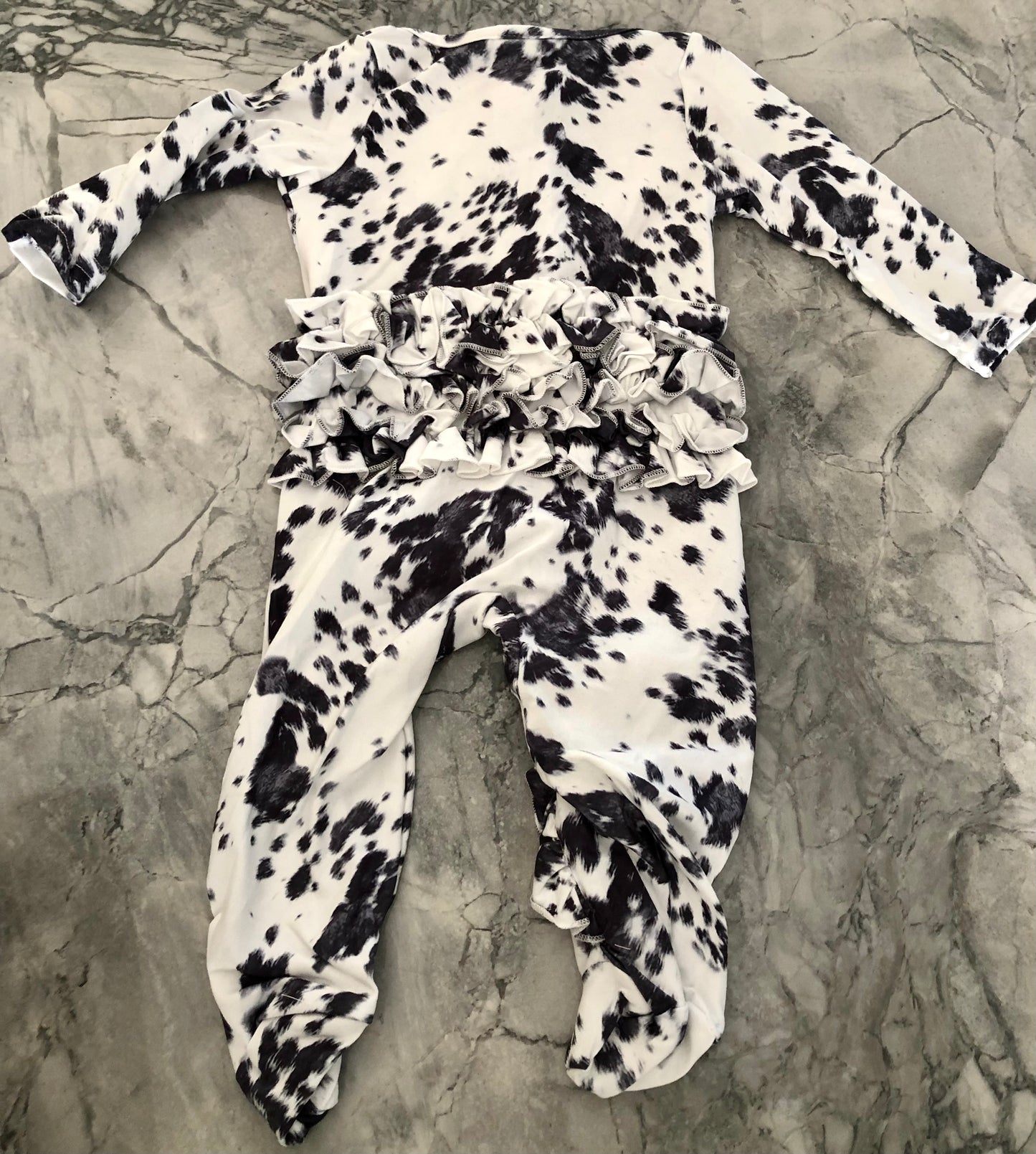 Cowprint footie romper