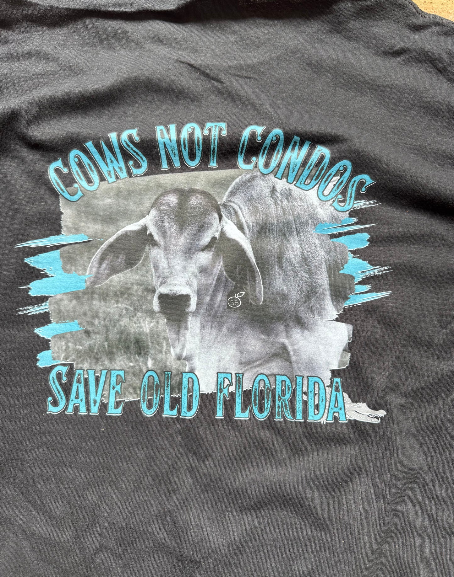 55 Oranges cows not condos long sleeved