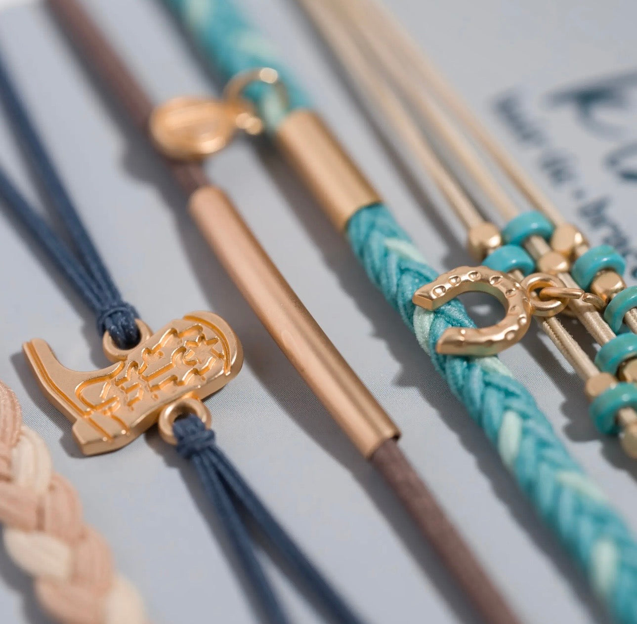 Stride turquoise and gold hair tie bracelets