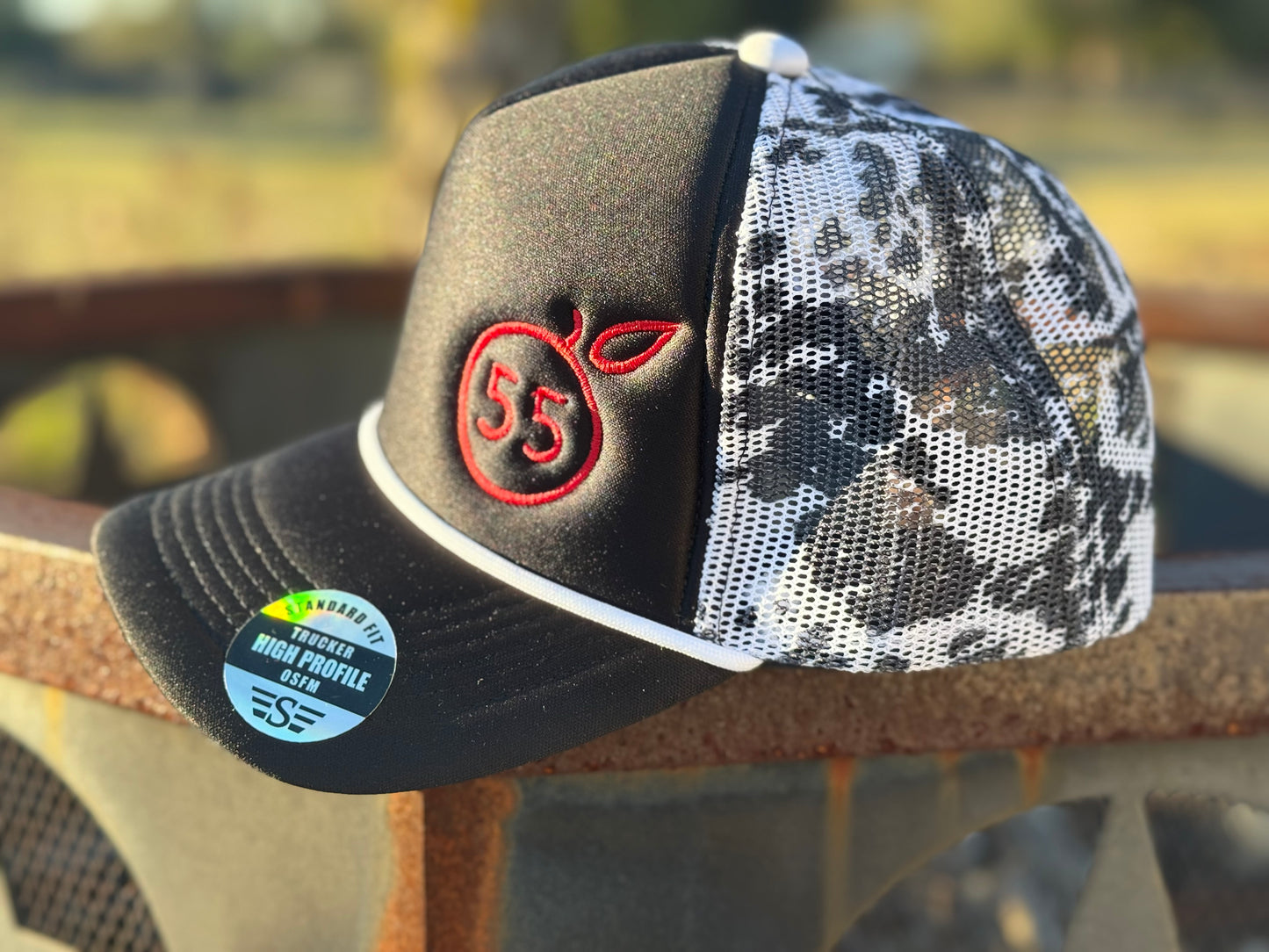 55 Branded cow print hat