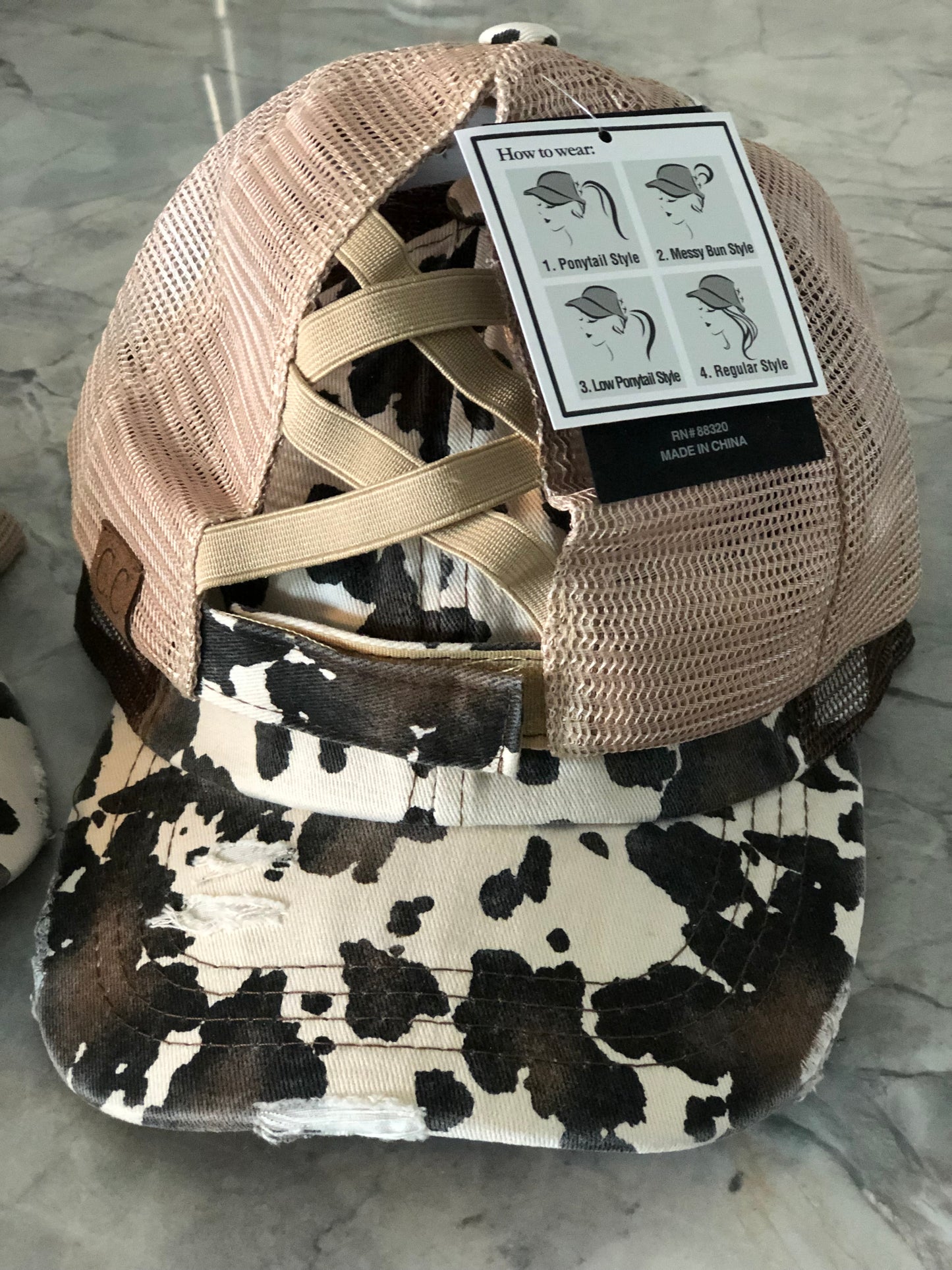 Cow print CC ponytail cap